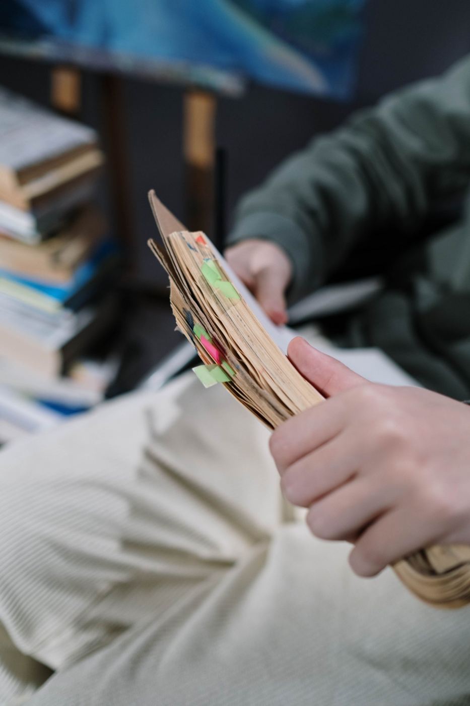 A well-used book full of coloured page tabs